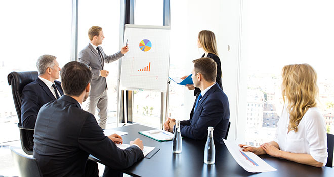 Business people giving a group presentation